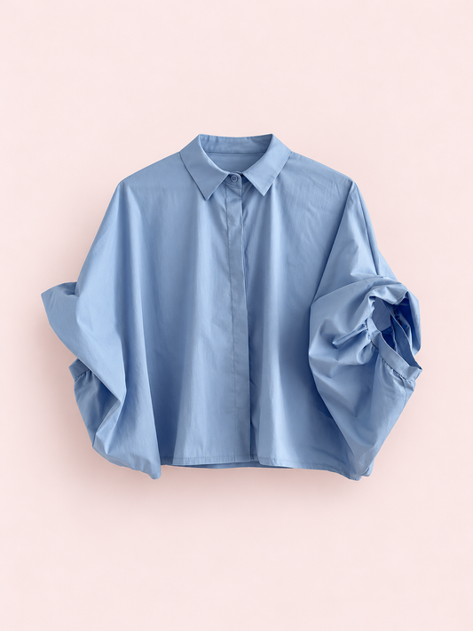 Azul Celeste | Camisa mangas Abullonadas - catálogo Matilusca sobre fondo rosa empolvado