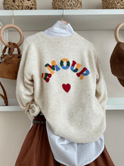 Jersey Amour crema, espalda con letras Amour