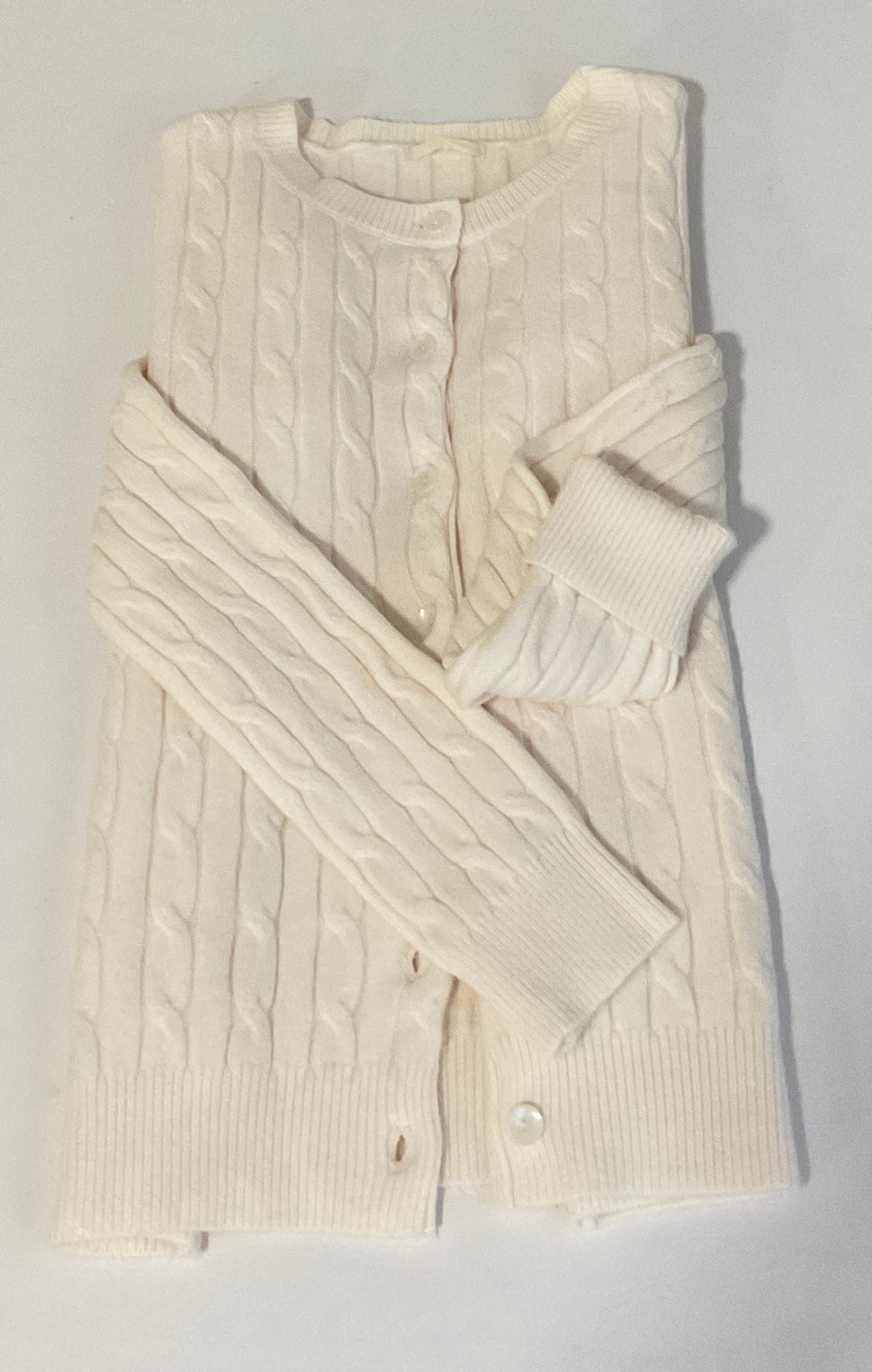 Crema — Chaqueta Punto Rebeca, prenda doblada