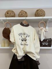 Beige | Sudadera Asper Après Ski Club look con pantalón chocolate