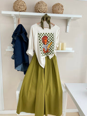 Look completo con sudadera Verde/Crema y falda verde