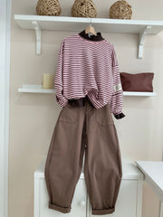 Look completo con sudadera oversize de rayas rosa y chocolate